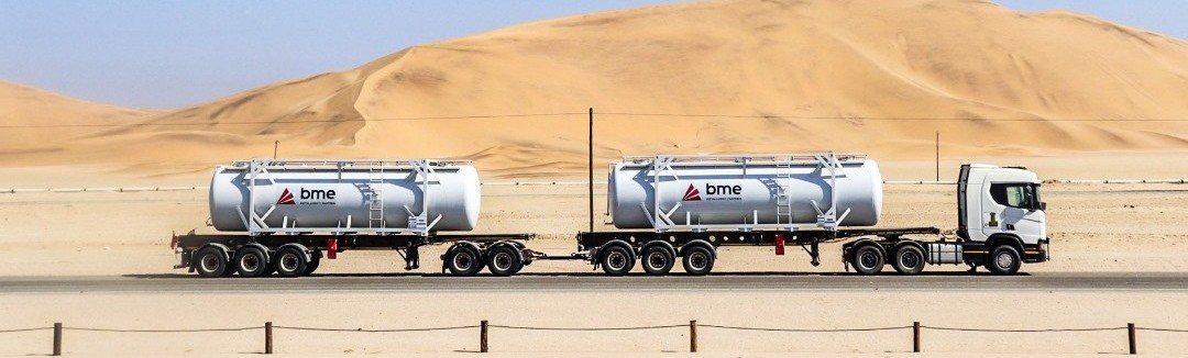 Van der Walt Logistics PBS powder tanker road train in the Namib dunes